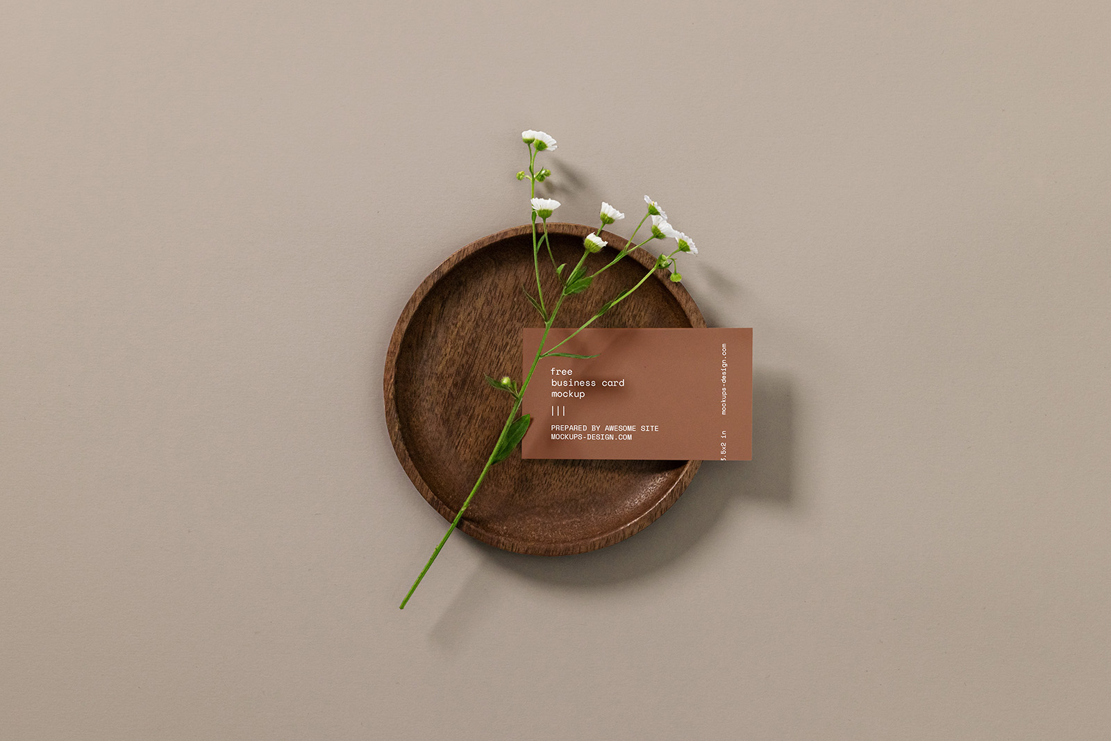 Business card with a flower mockup