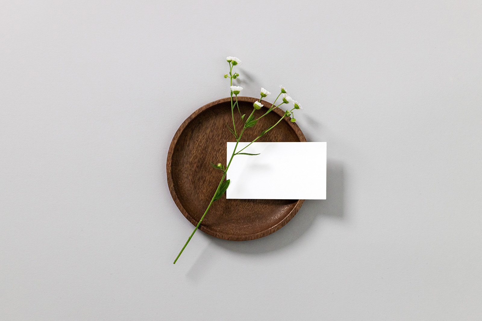 Business card with a flower mockup