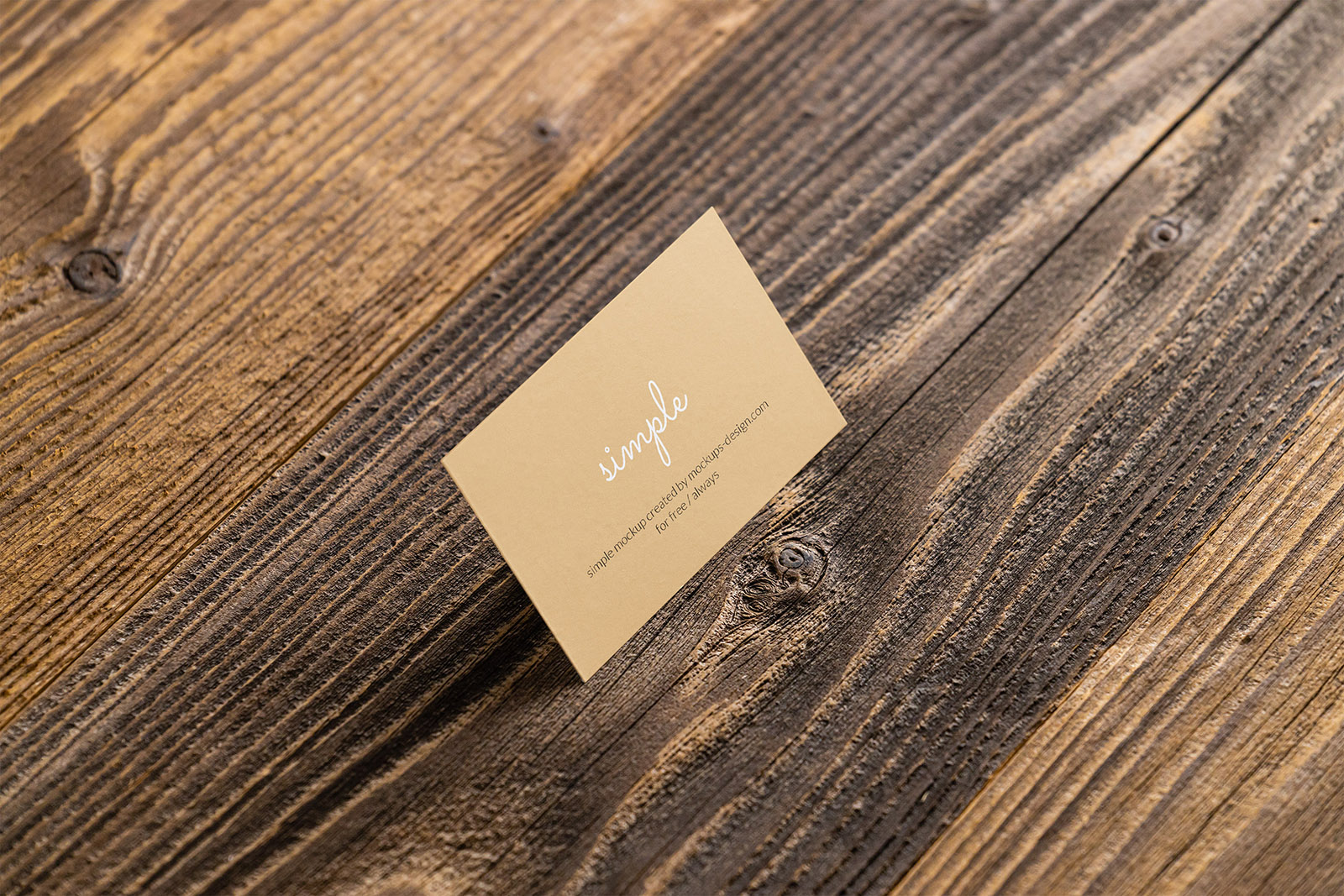 Business card on wooden planks mockup
