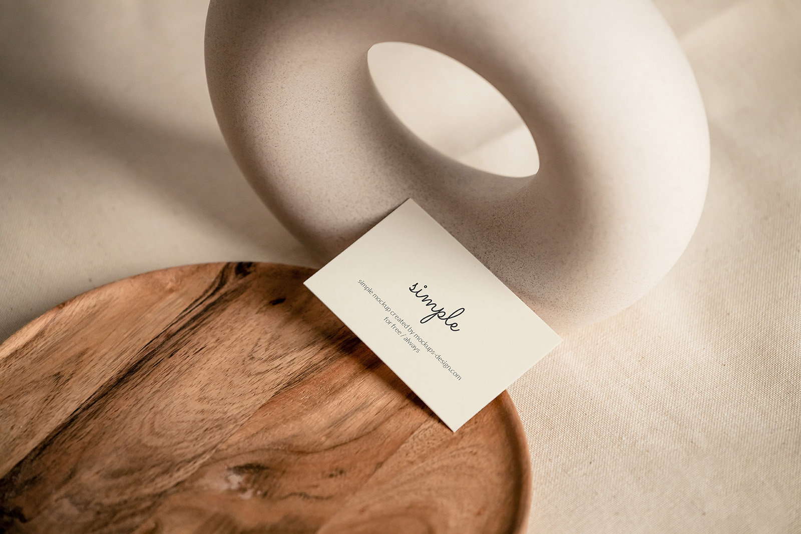Business card on wooden tray mockup