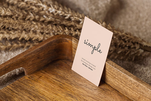 Business card in wooden tray mockup
