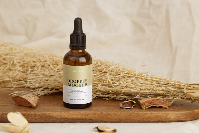 Dropper bottle with essential oil mockup