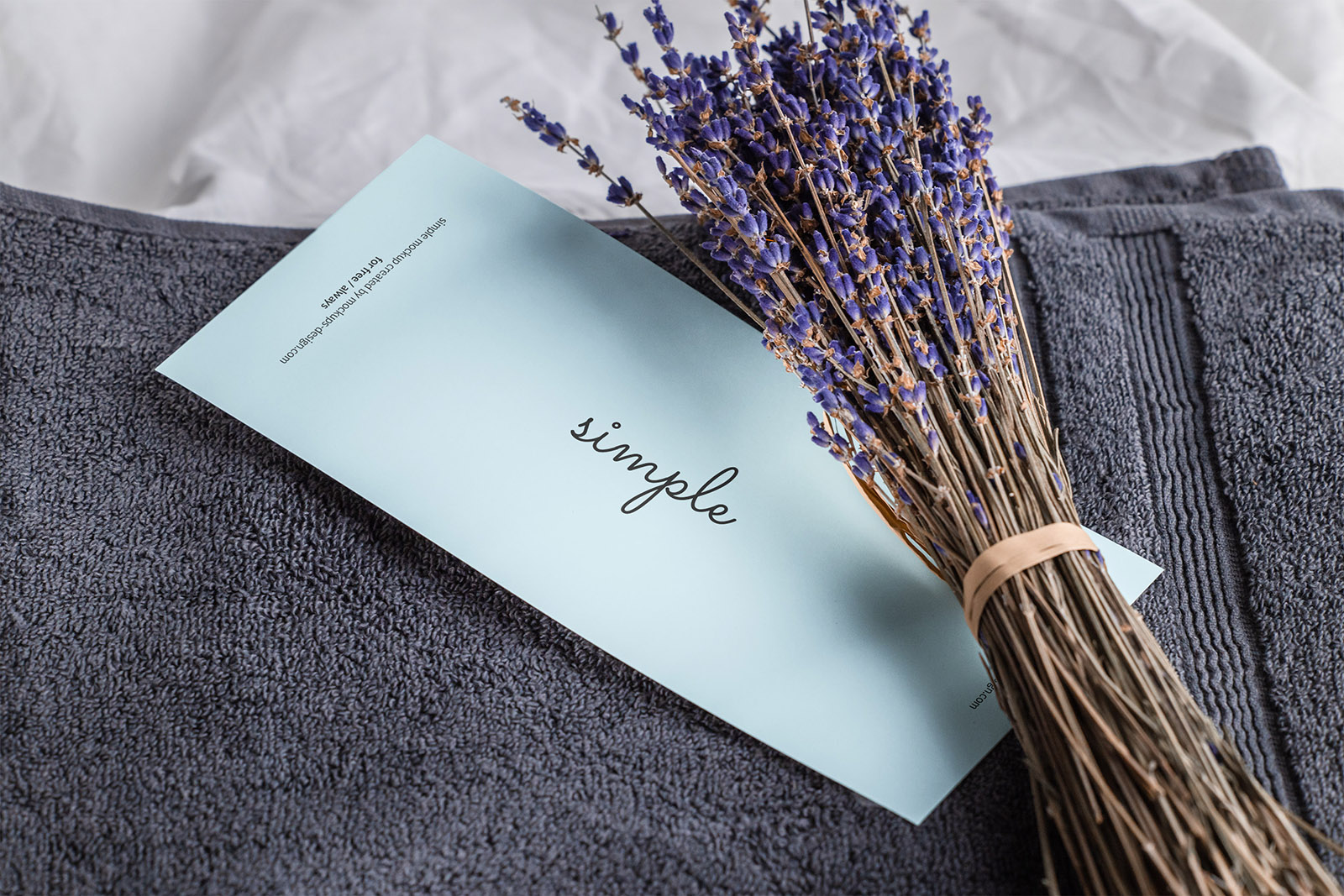 DL flyer on towel with lavender mockup