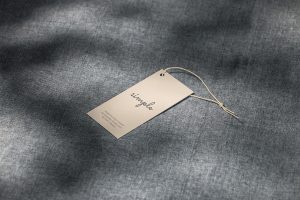 Label tag on grey material mockup - Mockups Design