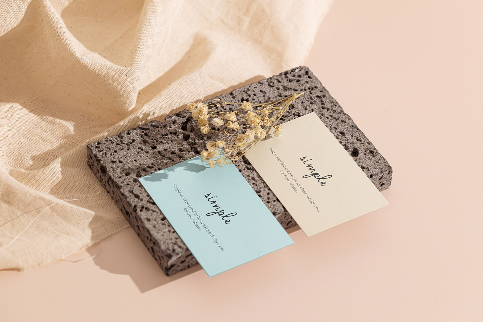 Two business cards on stone mockup