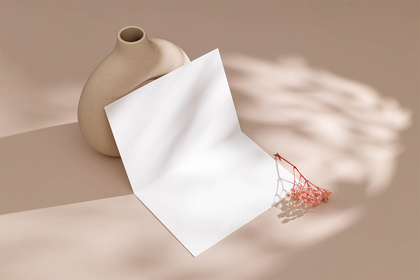 Bi fold flyer with flowerpot mockup