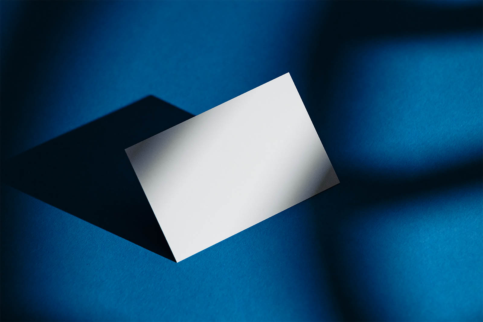 Business Card on Blue Background
