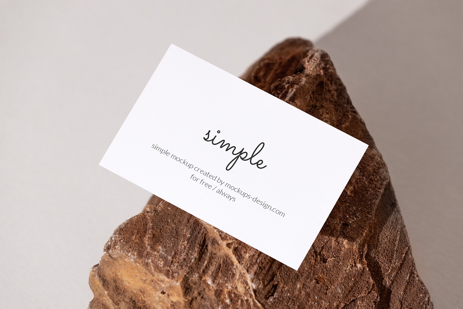 Business card on a rock mockup