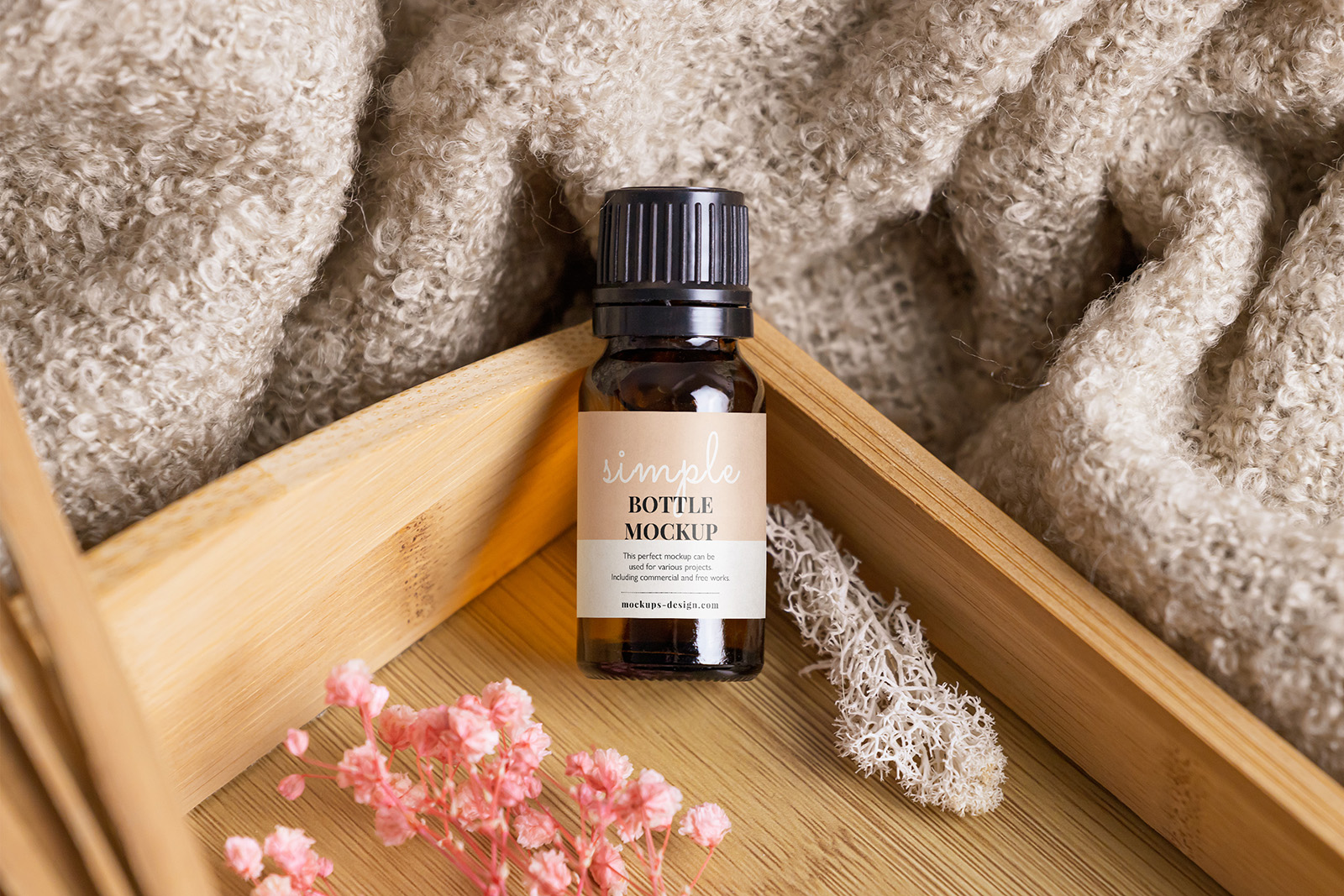 Essential oil bottle in the tray mockup