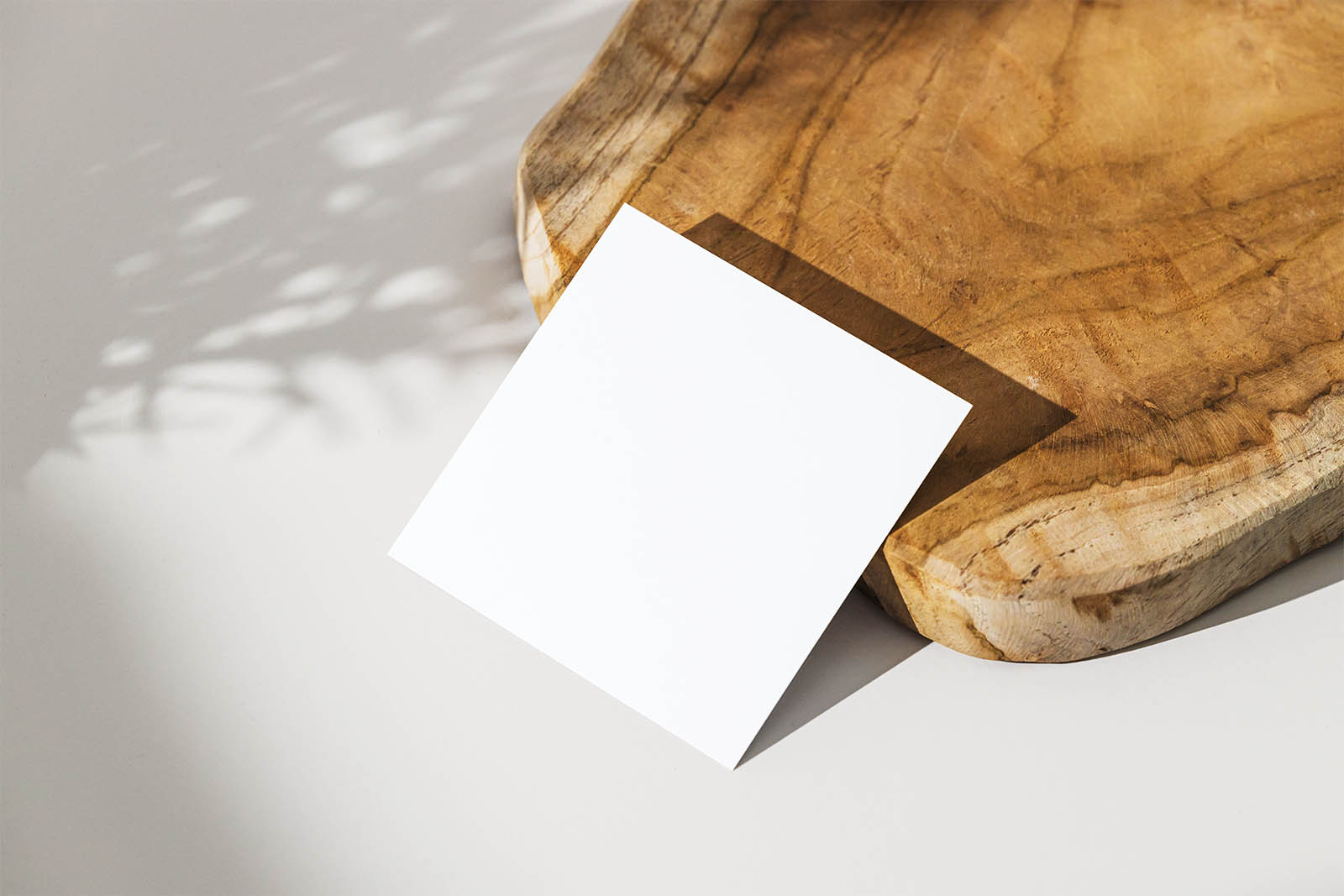 Square flyer with wooden board mockup
