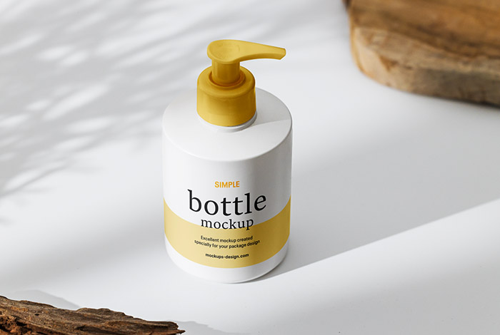 Bottle with pump on white background mockup
