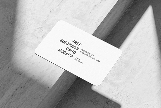 Rounded business card on concrete mockup