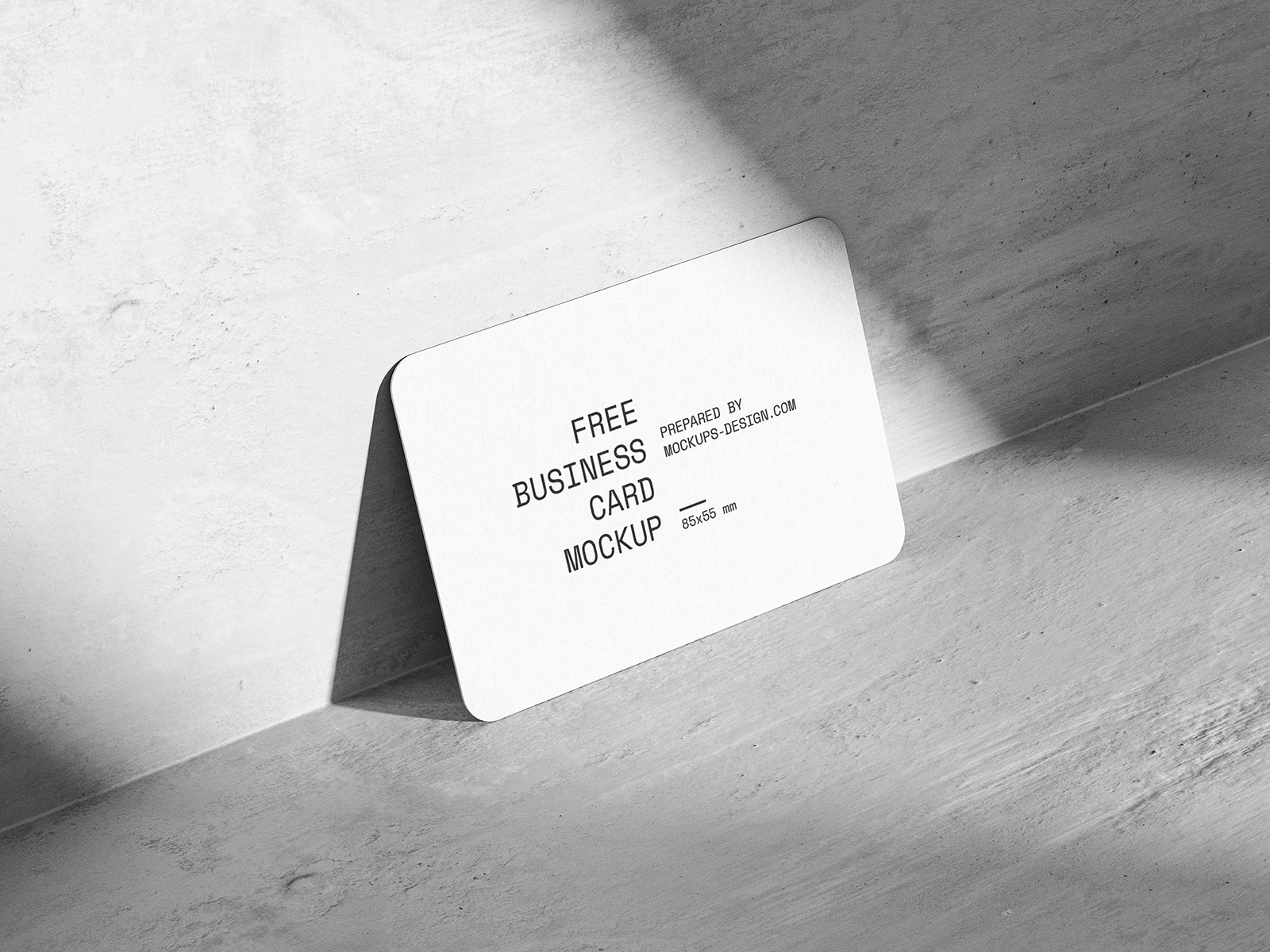 Rounded business card on concrete mockup