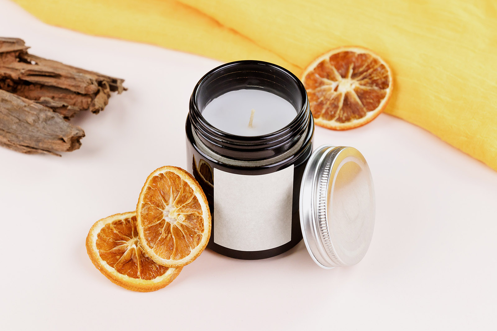 Candle with dried oranges mockup