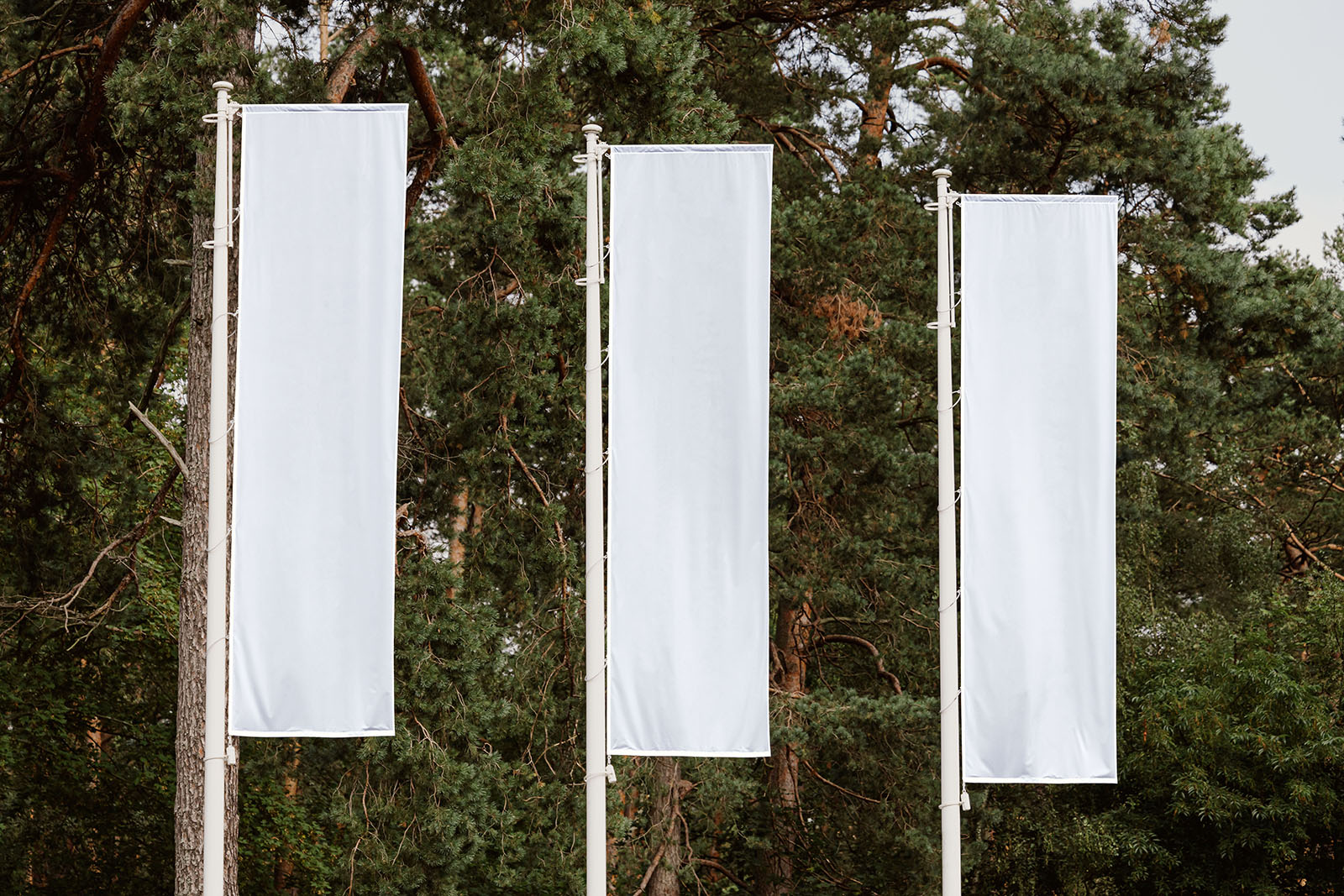 Three banner flags mockup