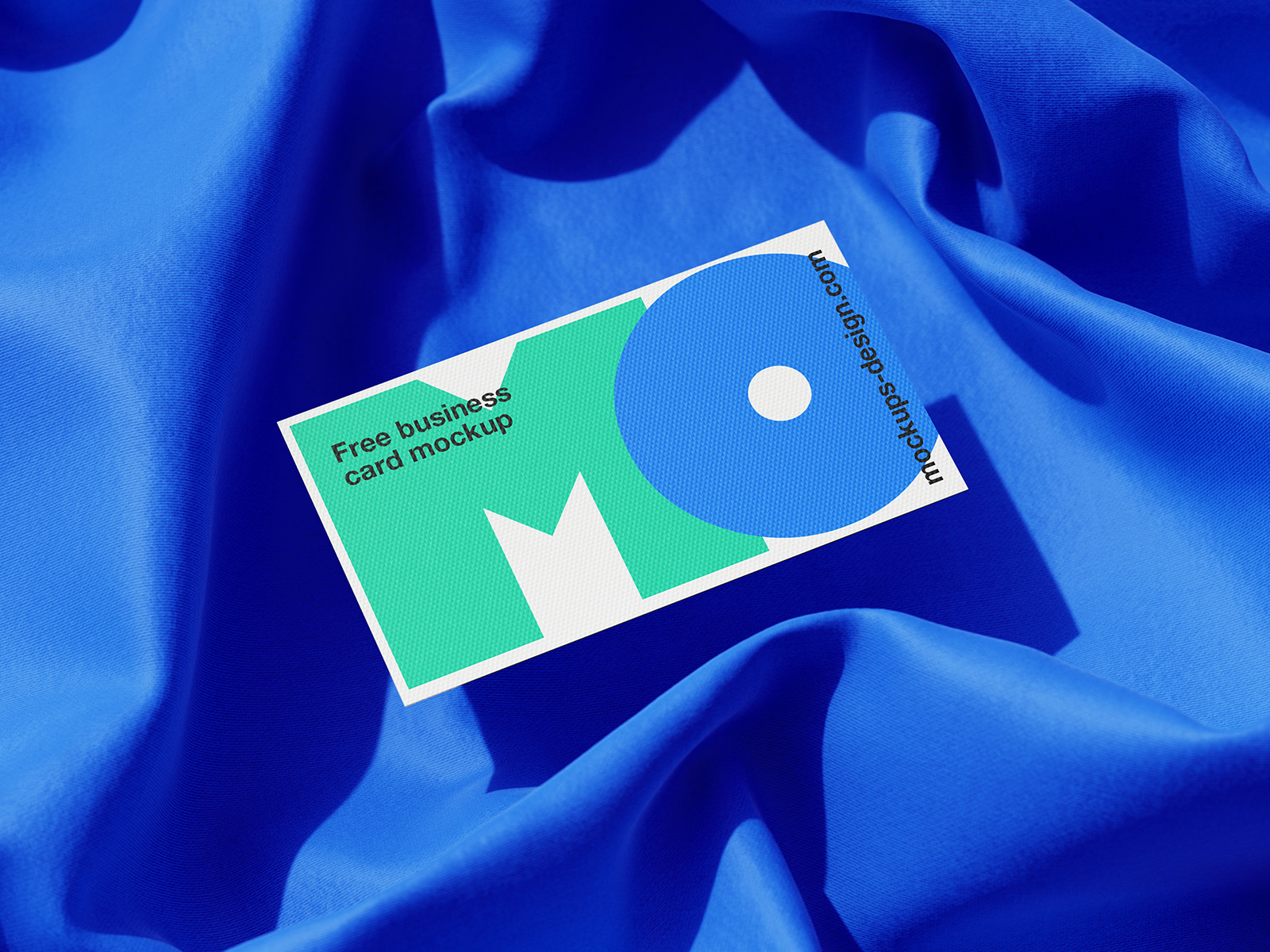 Business cards lying on a fabric mockup