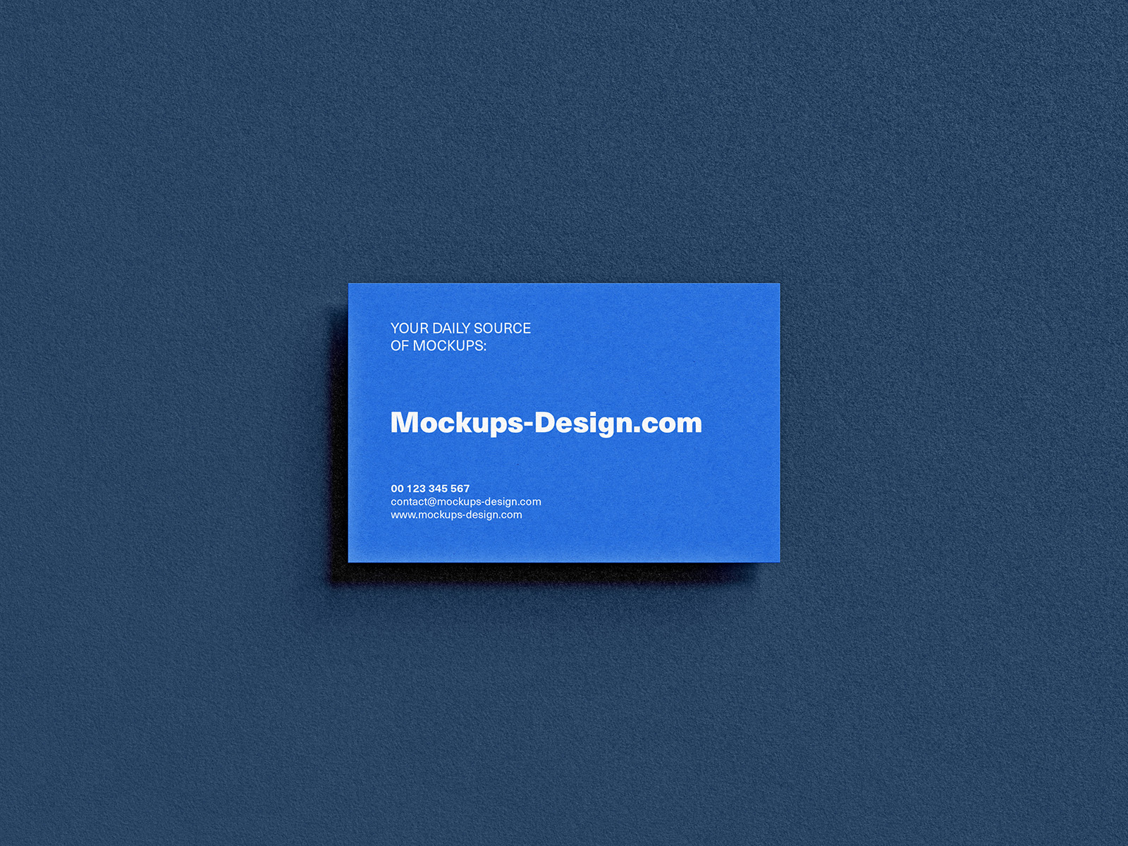 Business card on textured paper mockup