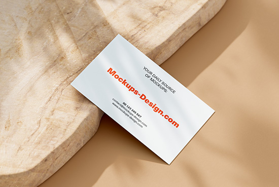 Business cards on a piece of wood mockup