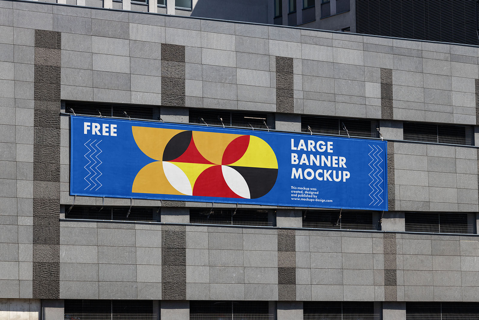 Large banner on grey building mockup