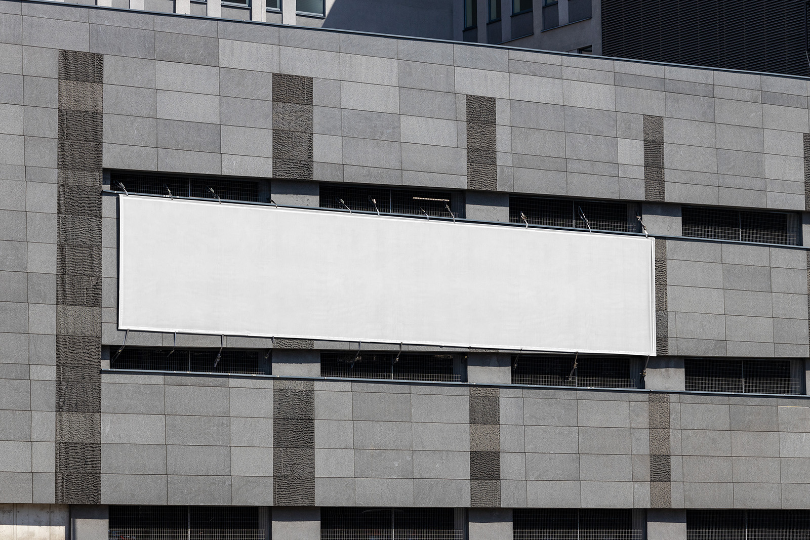Large banner on grey building mockup