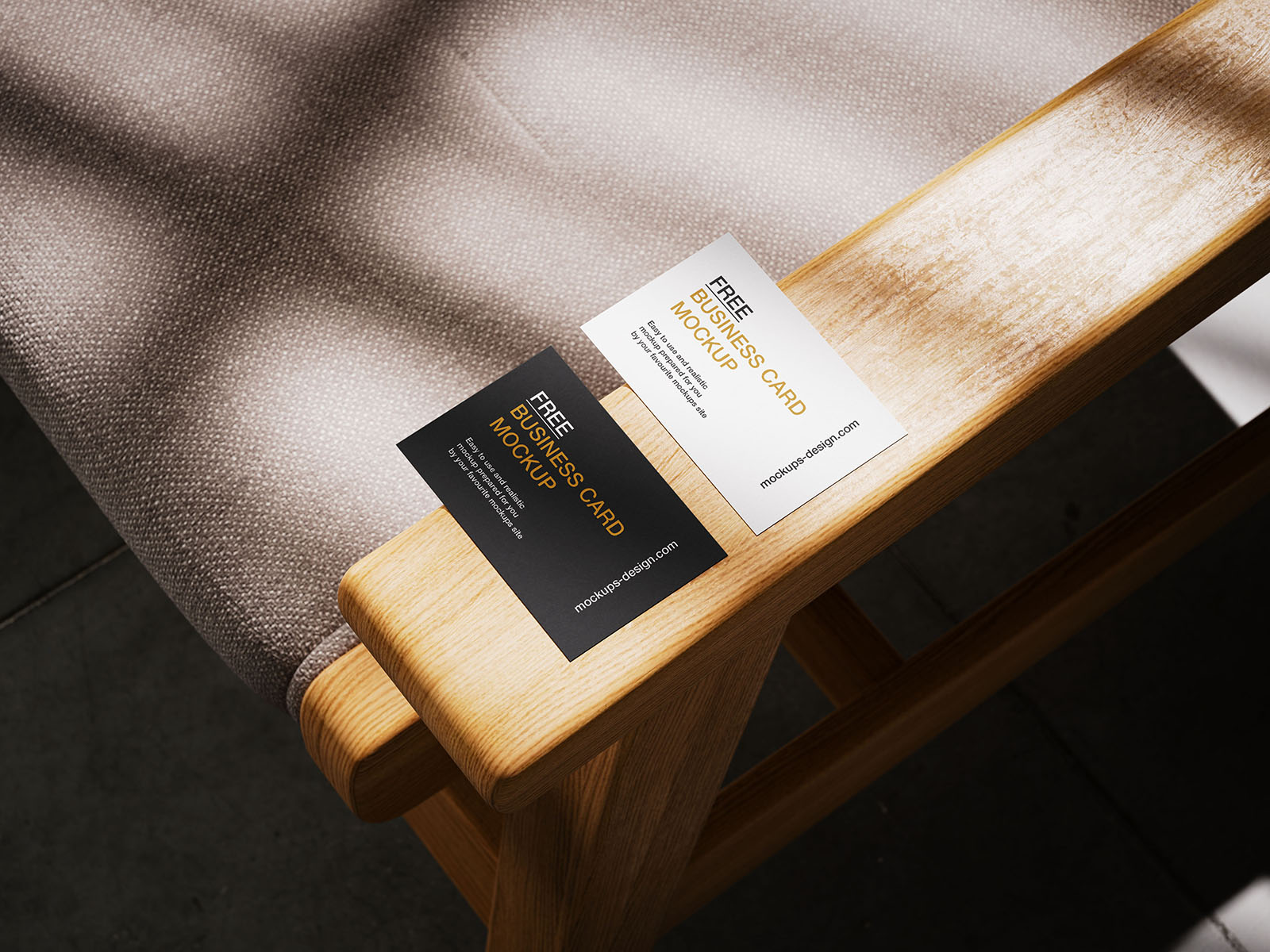 Business card lying on armchair mockup