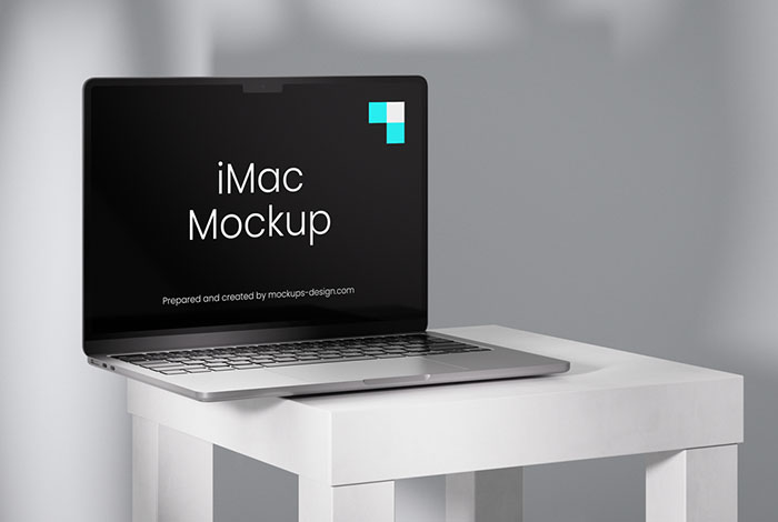 MacBook on a table mockup