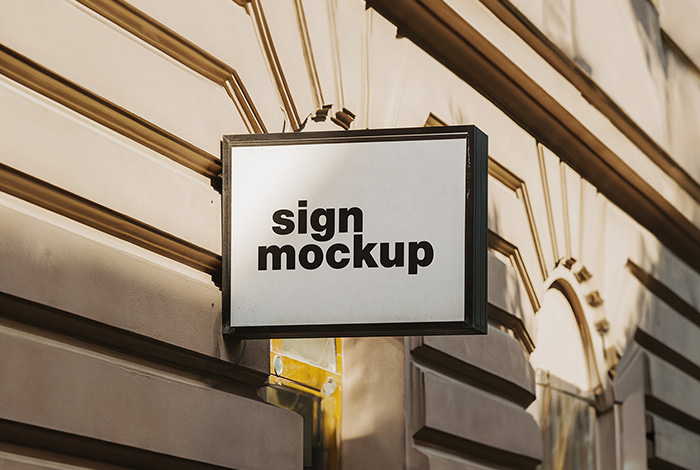 Signboard on the builiding wall mockup