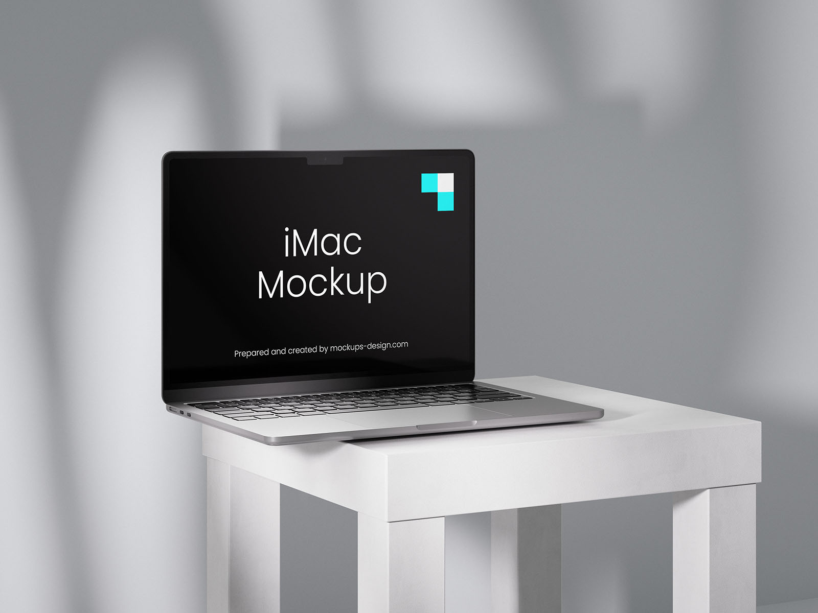 MacBook on a table mockup