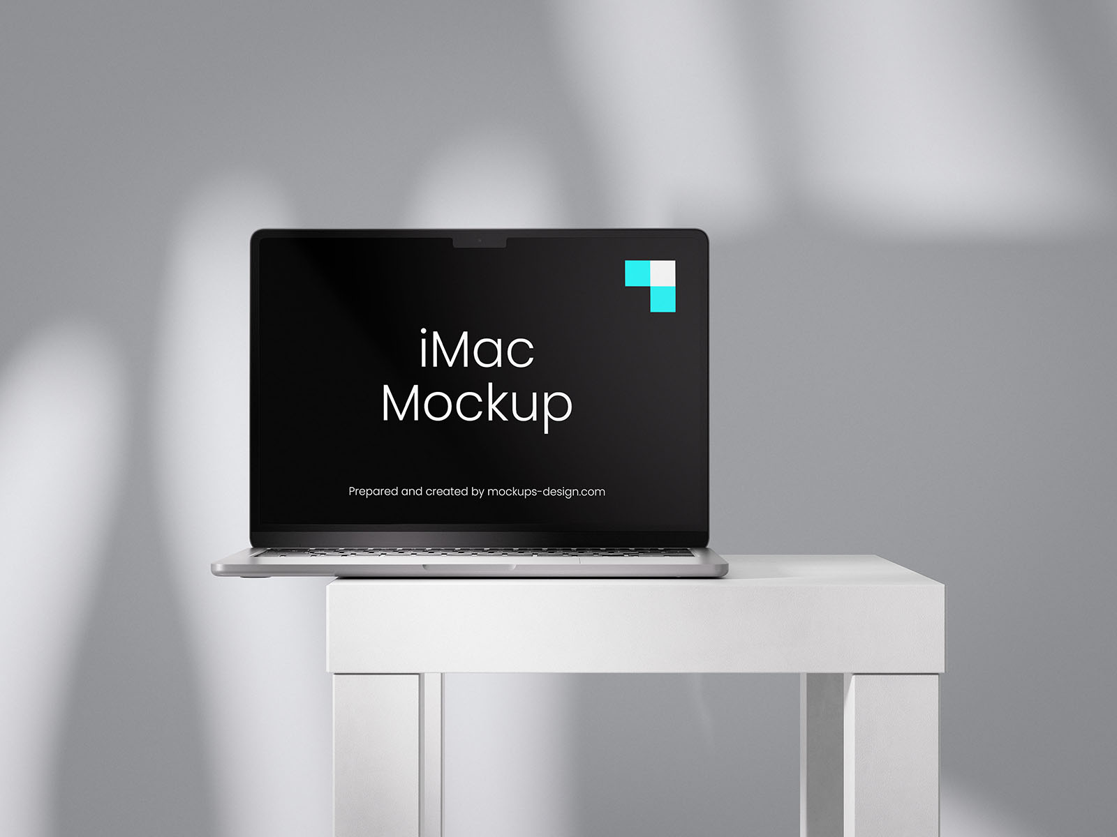 MacBook on a table mockup