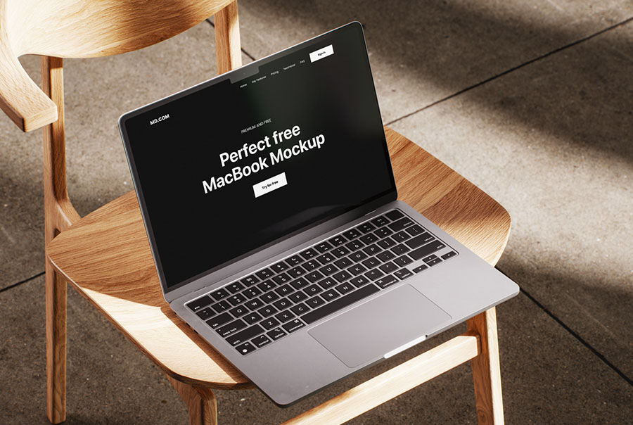 MacBook mockup on wooden chair