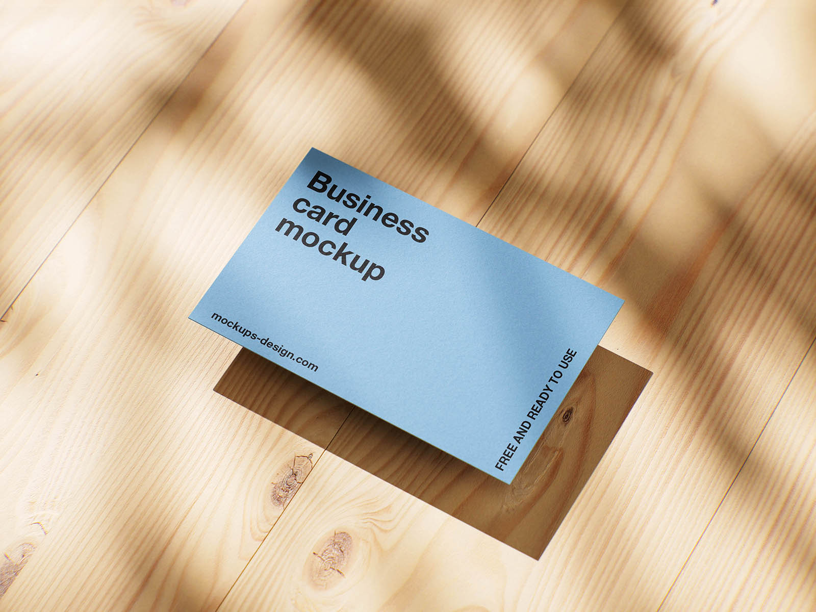 Business card on wood panels mockup