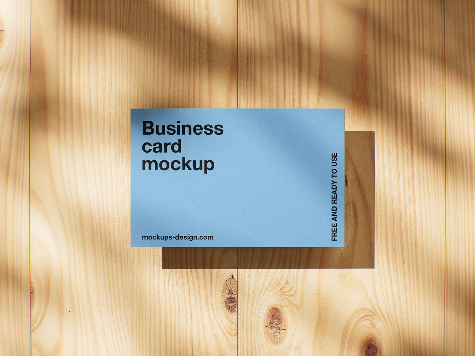 Business card on wood panels mockup