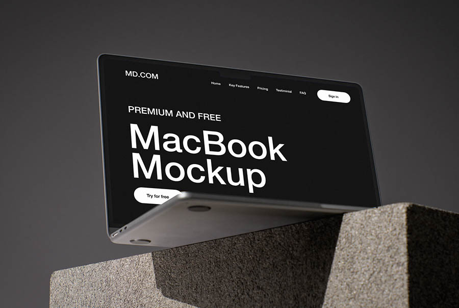 MacBook on concrete cube mockup