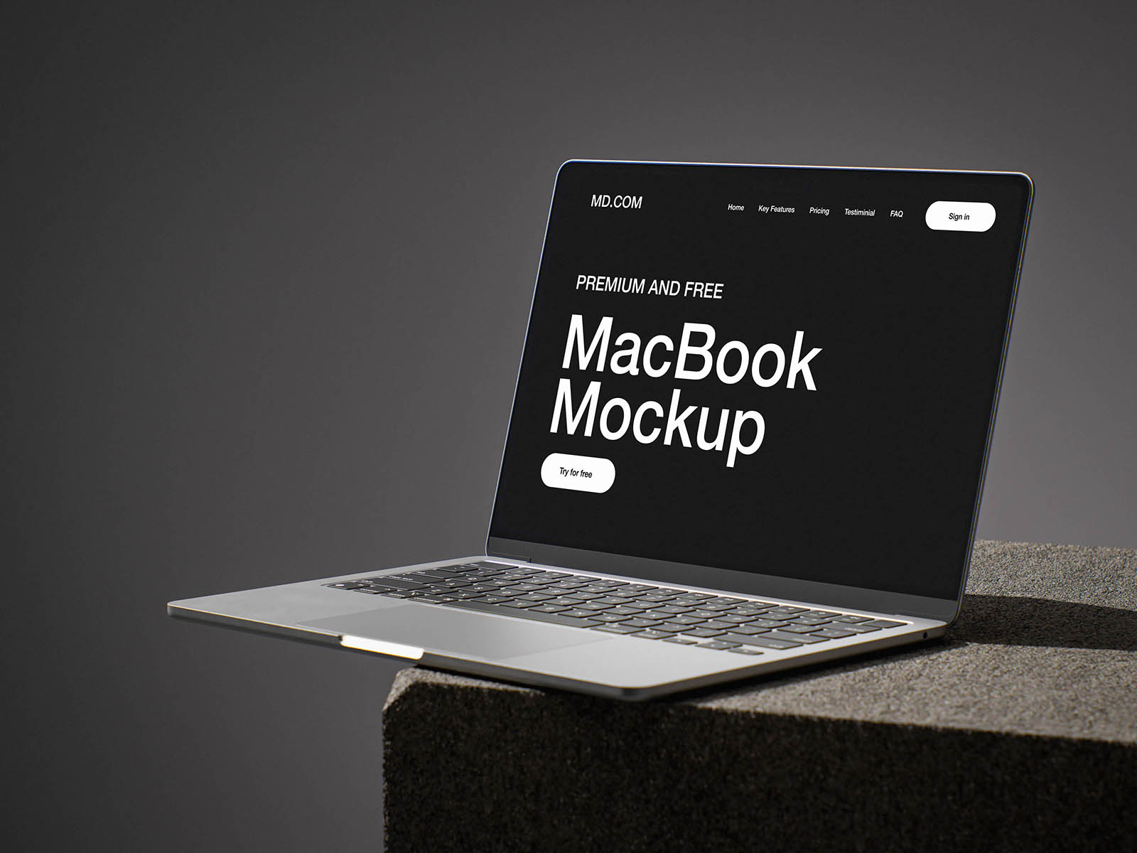 MacBook on concrete cube mockup